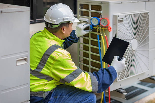 Professional Hvac technician working in Adams, WI